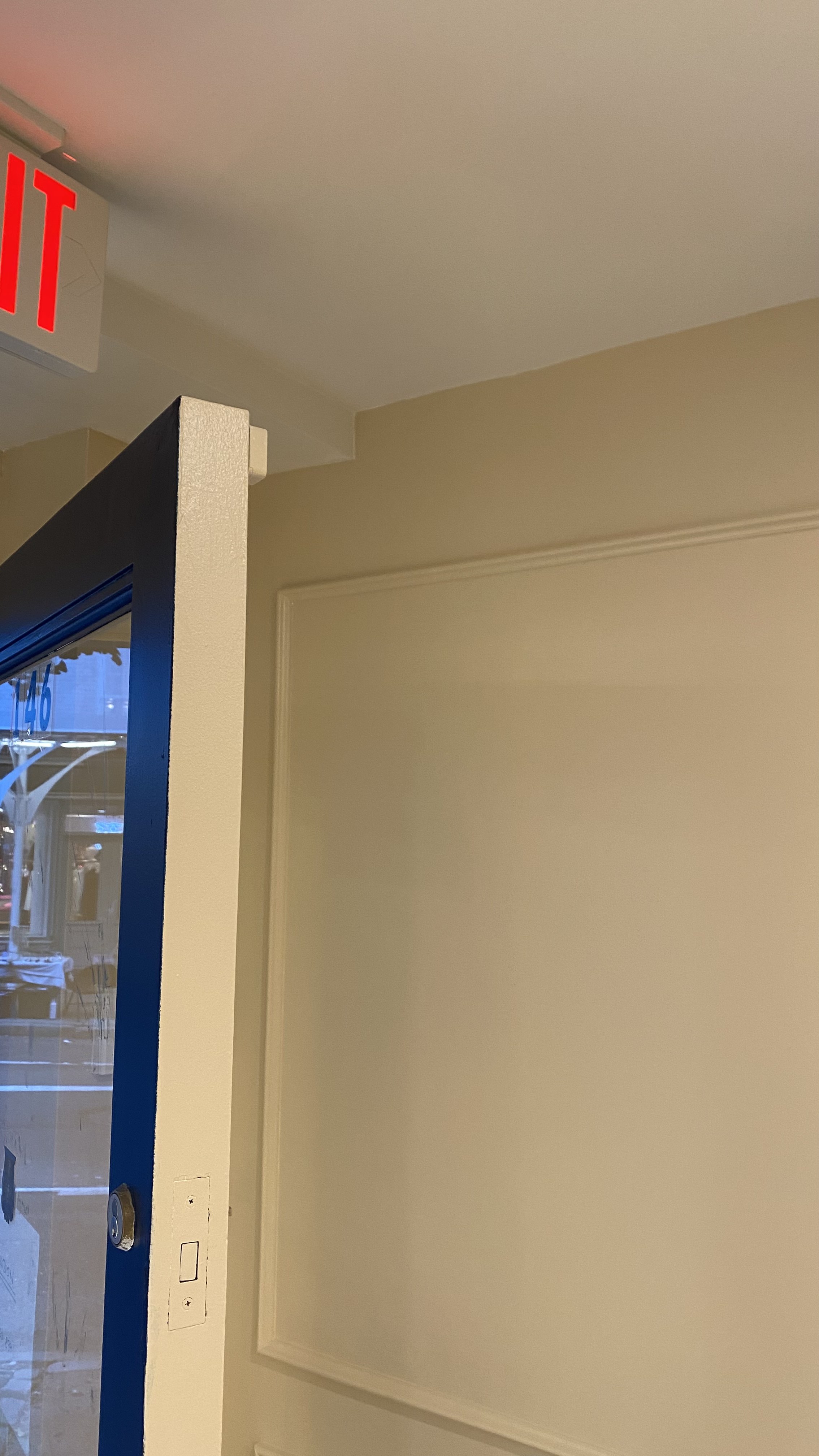 Finished SOHO storefront with painted walls and custom molding — photo 2 of 4